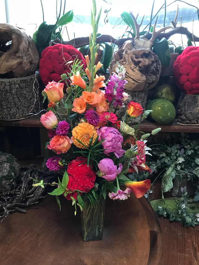 Lush birthday arrangement of peonies, roses, and hydrangea