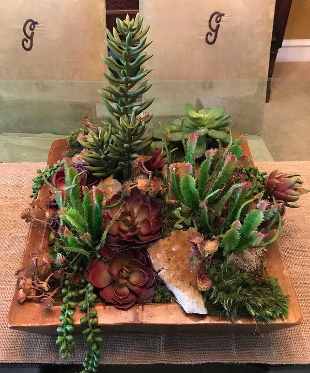 Faux succulent planter finished with geode crystal accents